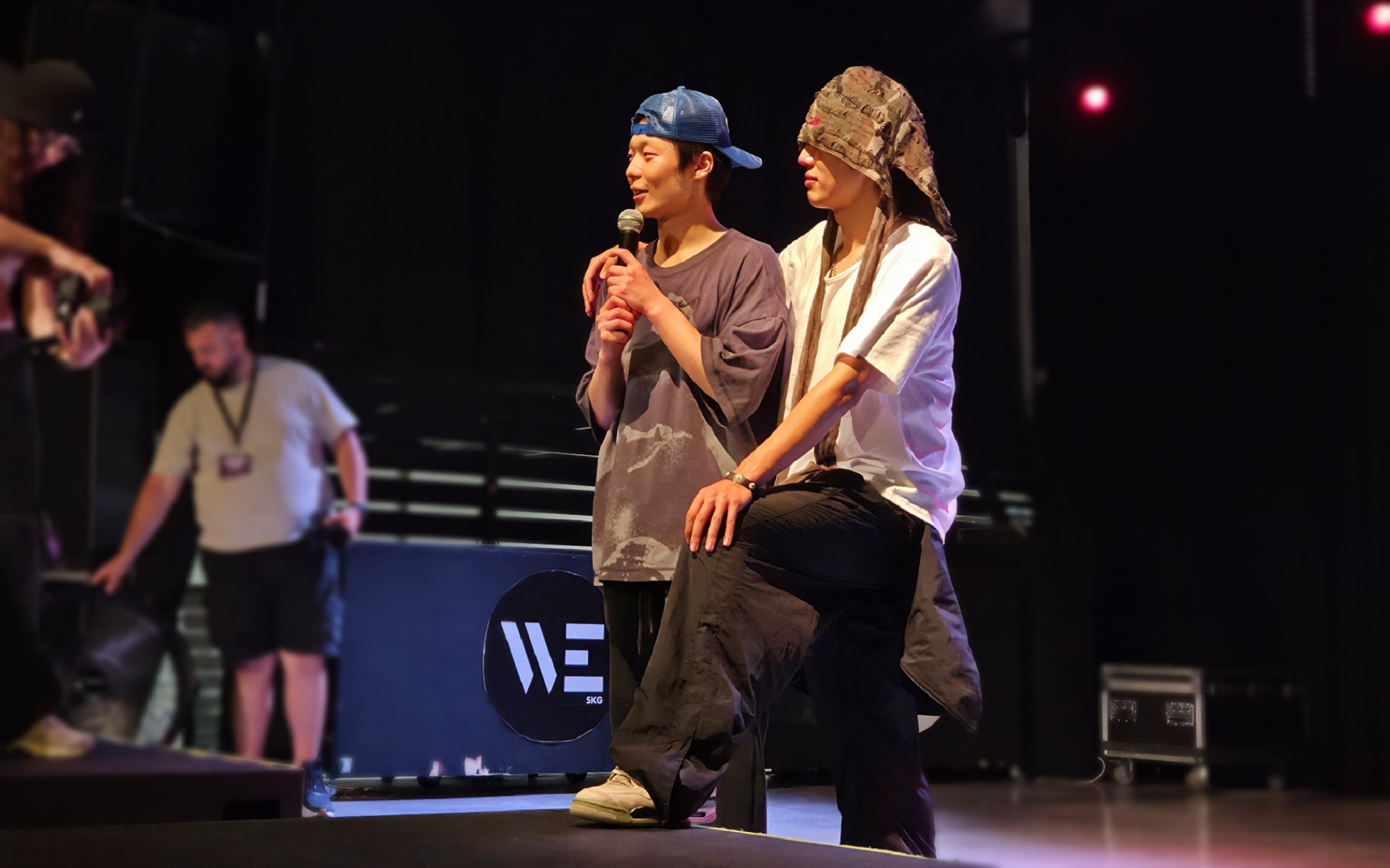 From left to right, Jimmy and Hui speak with participants after their collaboration workshop