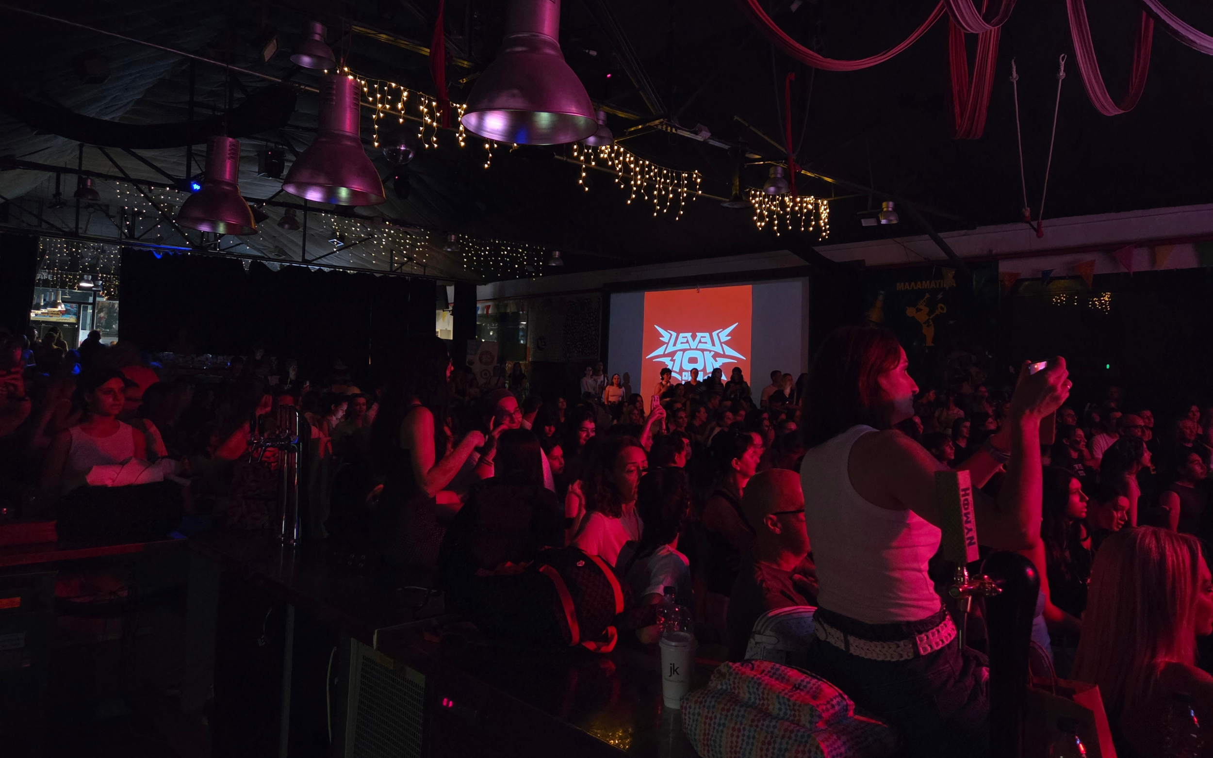 Dancers and spectators fill the venue during the K-pop cover competition